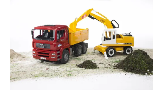 MAN TGA Wywrotka i Koparka Liebherr